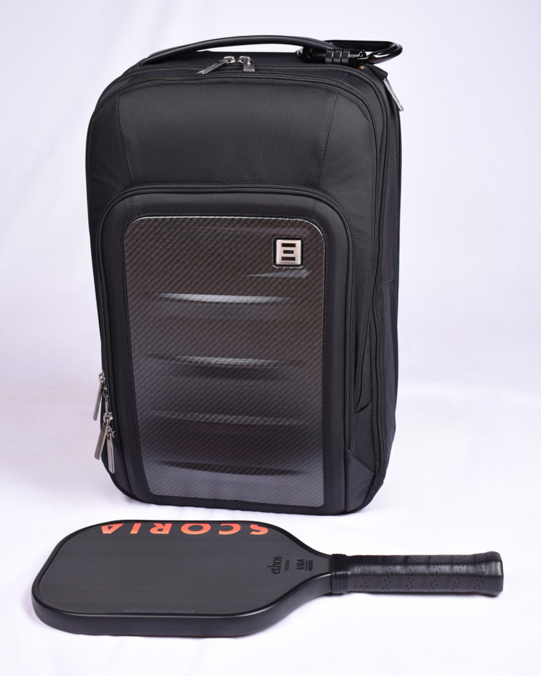 Black backpack with a paddle on a white background