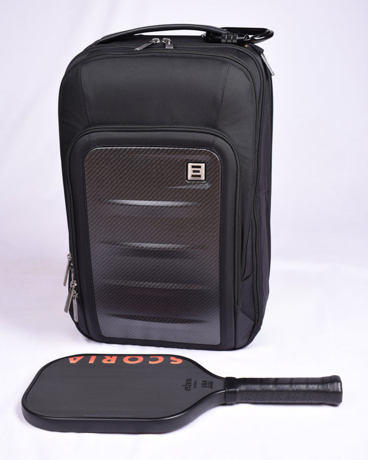 Black backpack with a paddle on a white background